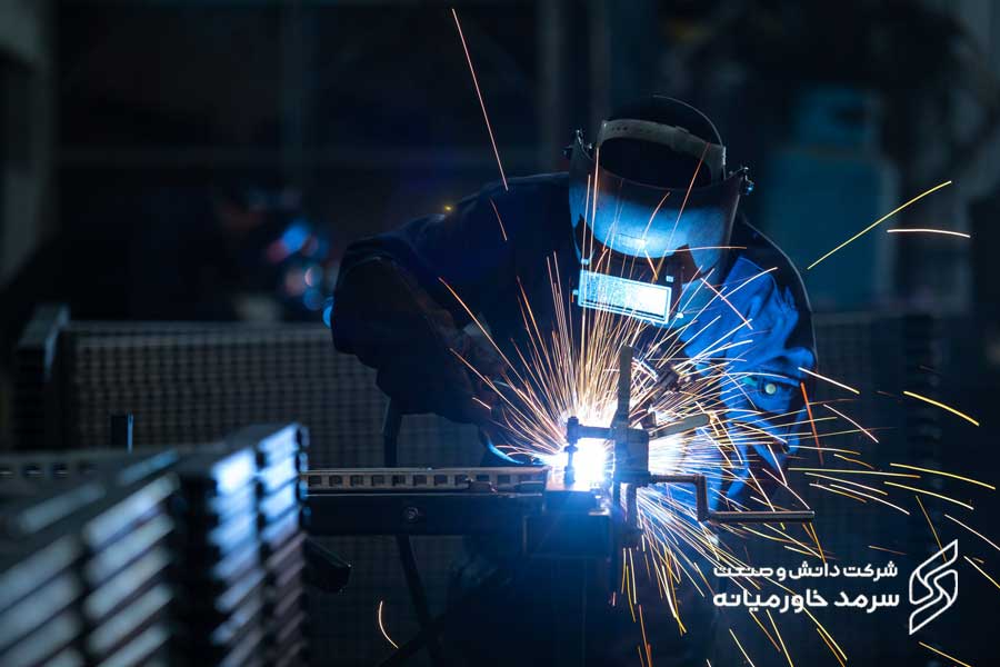 workers wearing industrial uniforms welded iron mask steel welding plants